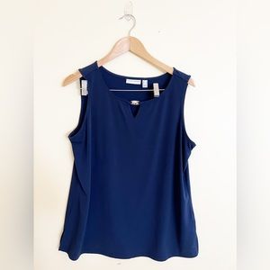 Susan Graver Liquid Knit Sleeveless navy top with silver detail.